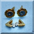J12. Gold cufflinks and collar points. 